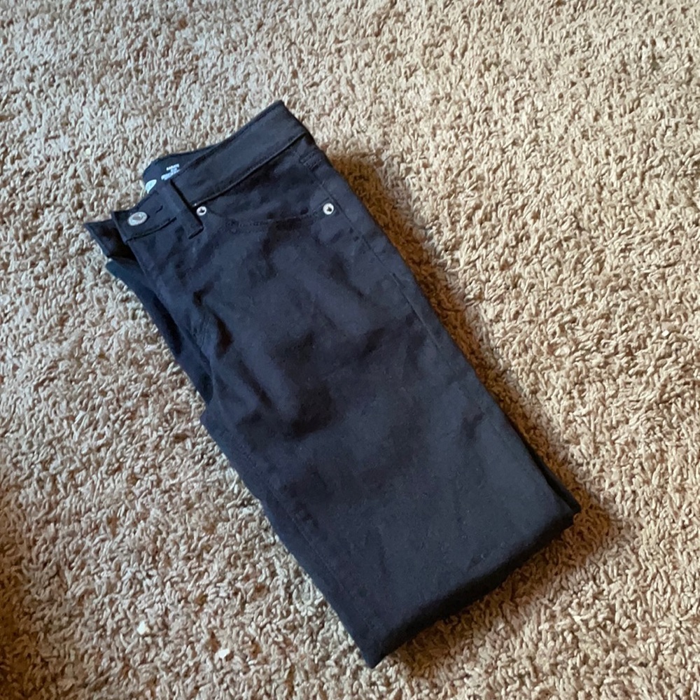 Boys black distressed jeans.